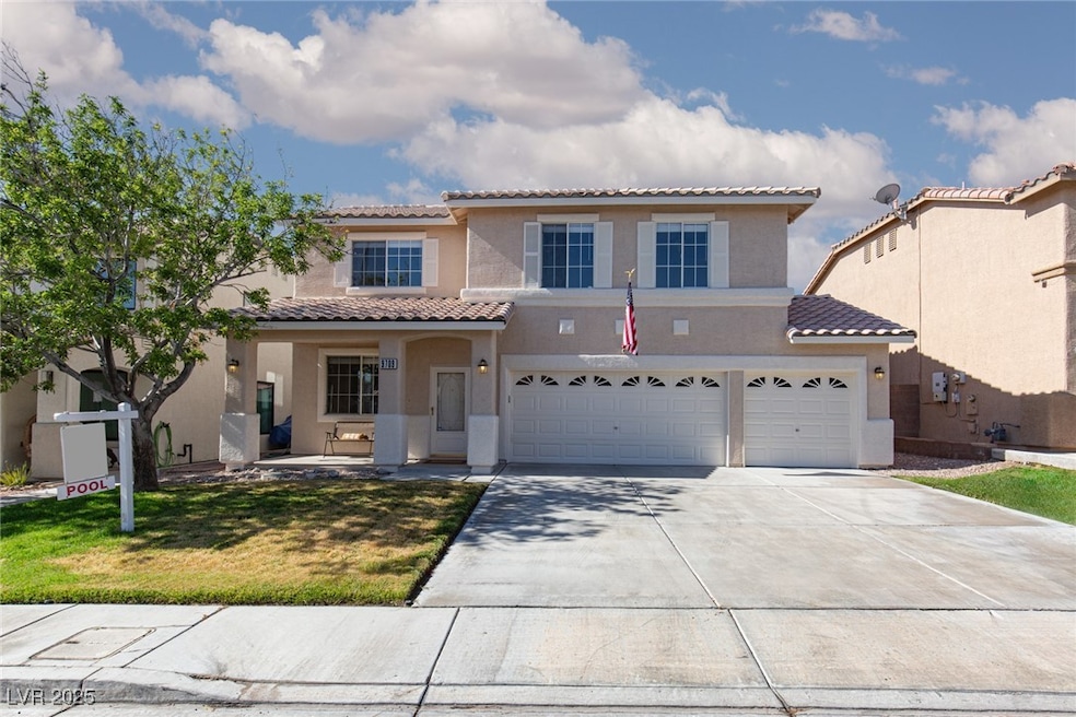 Mediterranean / spanish-style home featuring a til