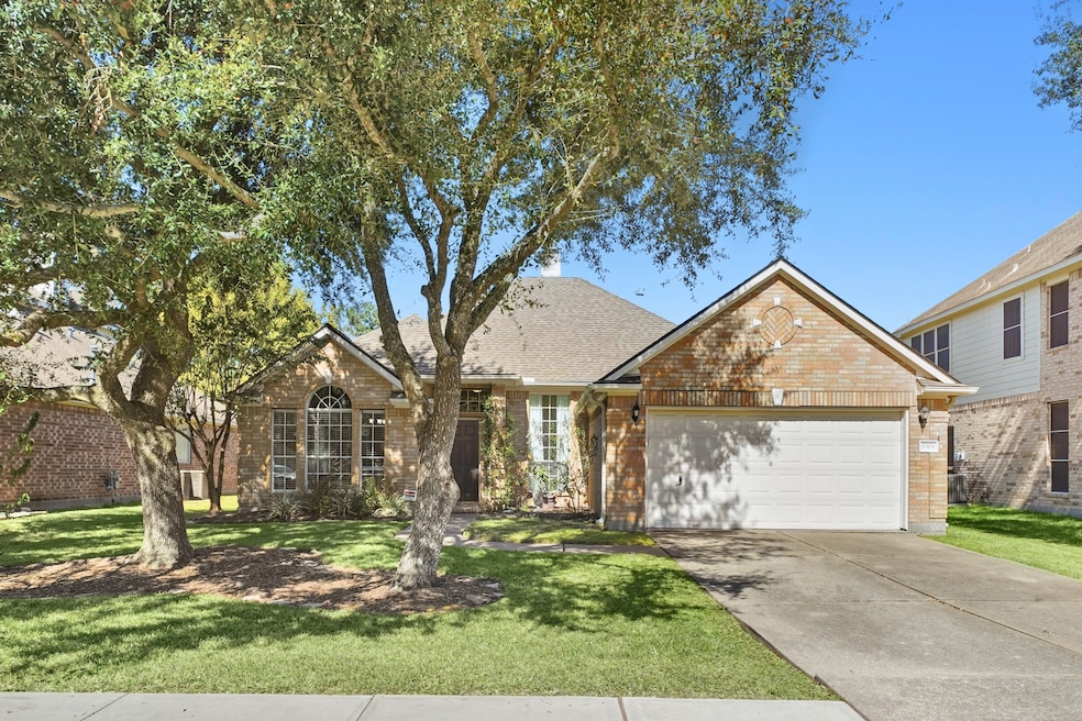 Welcome home to this beautifully maintained brick one-story featuring mature shade trees, a welcoming front entry, on a cul-de-sac lot. The inviting front includes an arched window and a neatly landscaped front yard. A spacious double driveway offering plenty of parking and convenience.