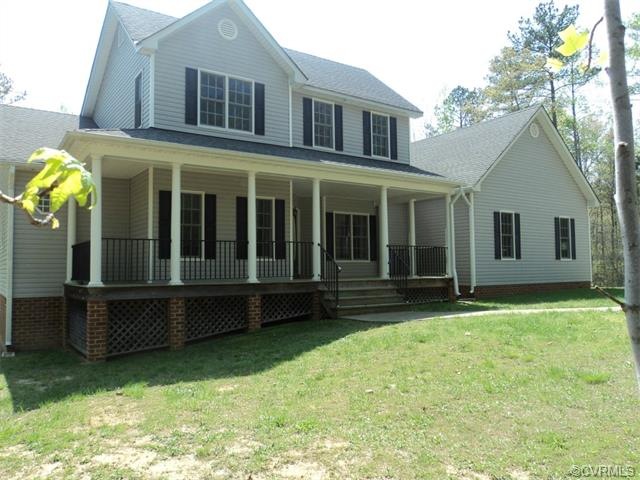 Front view - Garage on right - large front porch