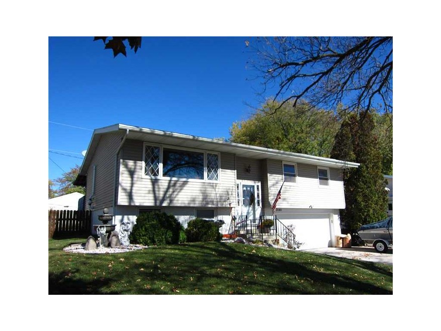 Front Exterior. Vinyl siding, manicured landscapin
