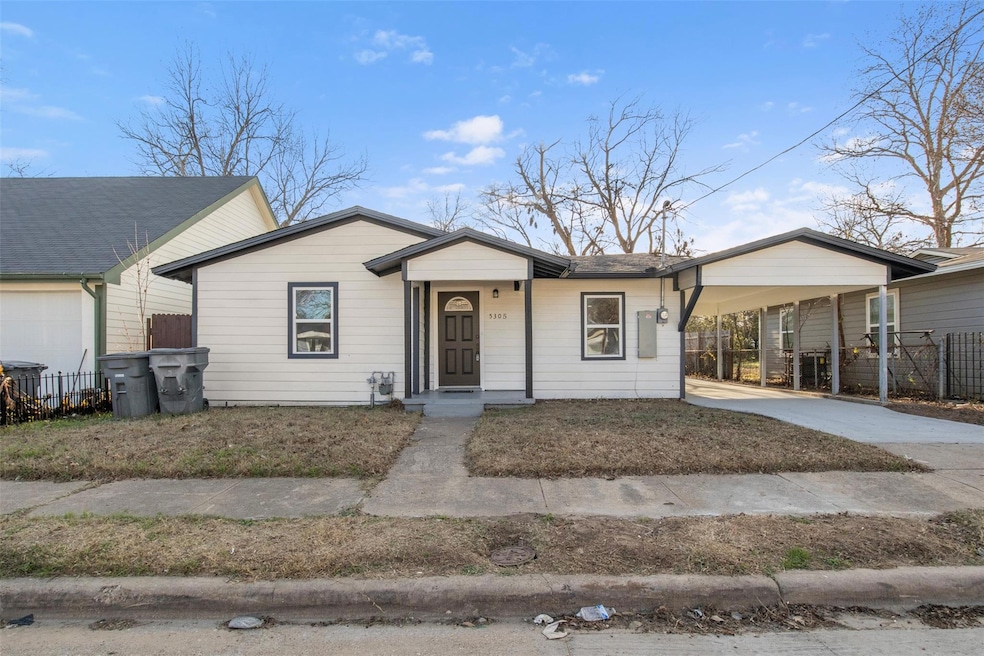 Ranch-style home with a carport