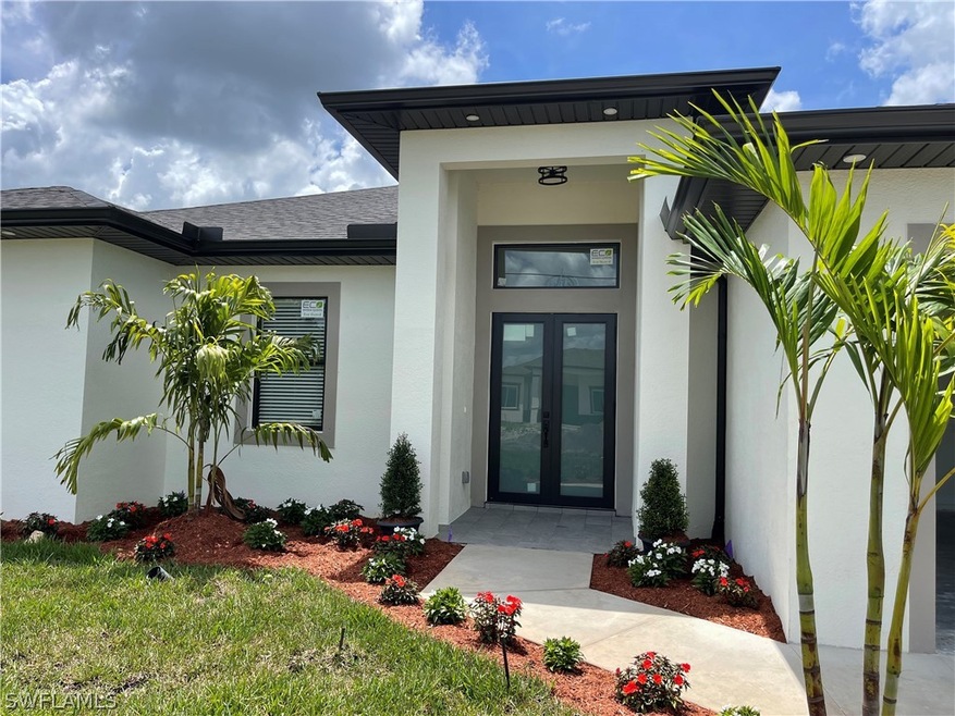 FRONT ENTRANCE AND GARDEN