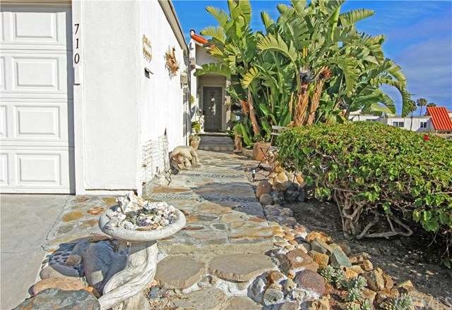 Entrance to your new home with custom patio, court