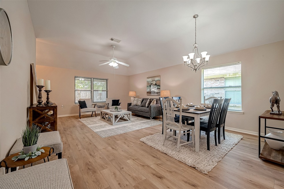 New laminate wood flooring through ou the living r