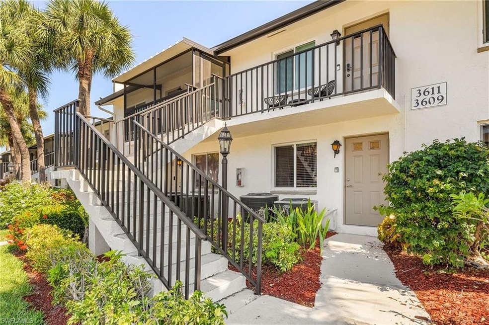 View of front of property featuring a balcony and 