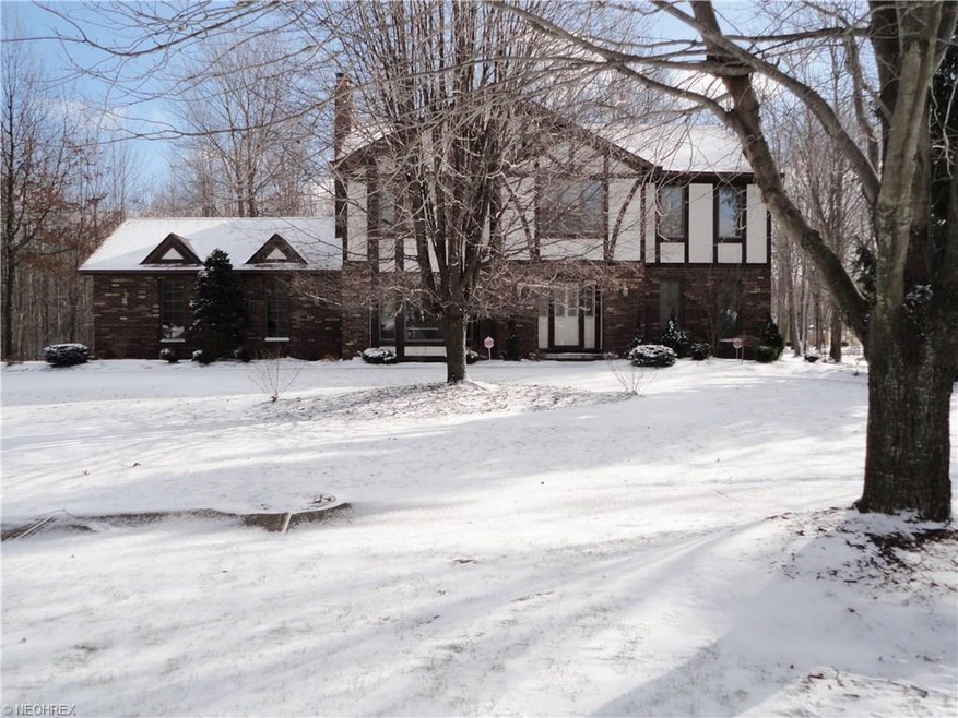 Welcome to this center hall colonial/tudor located