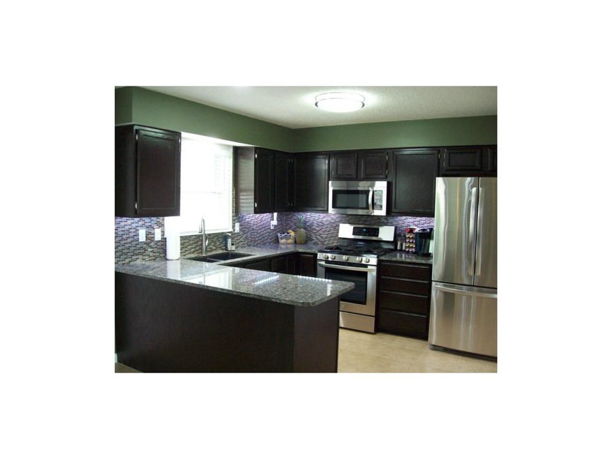 Updated Kitchen! Granite Counters! Tile Flooring!