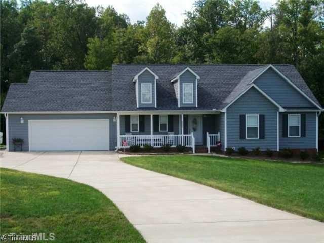 Exterior Front. Beautiful ranch situated in cul-de-sac on 2.47 acre lot backing up to stream and trees