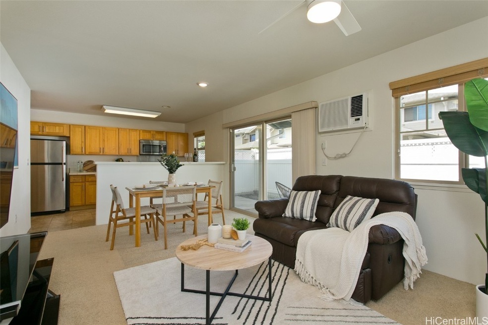 Inviting open-concept living/dining and kitchen ar