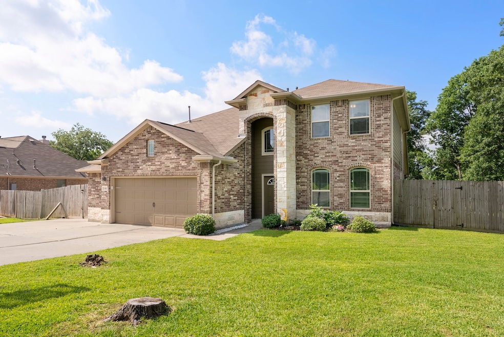 The front of the home welcomes you with a spacious