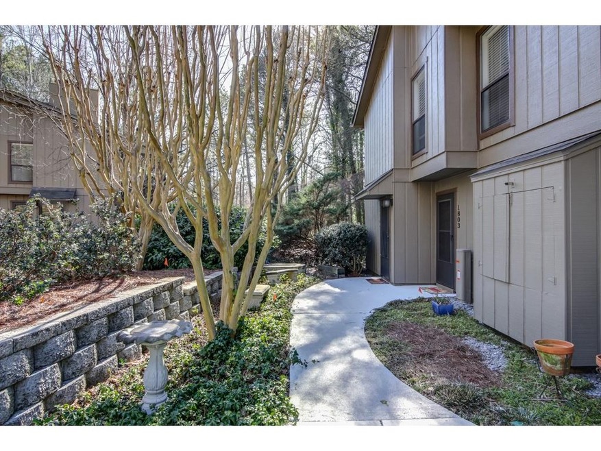 Private entrance to this top floor end unit