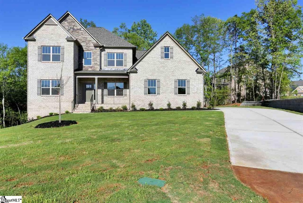 Full brick exterior, over 1 acre home site with si