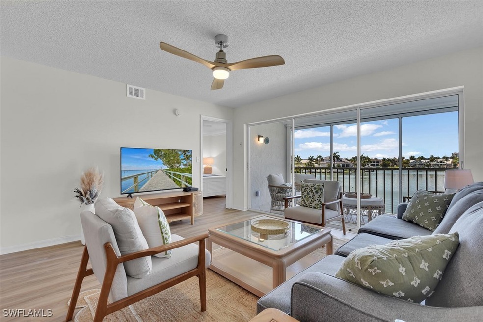10682 Gulf Shore Dr unit 205, Naples, FL 34108 - photo 1