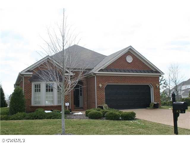 Exterior Front - Mostly Brick exterior, 2-car gara
