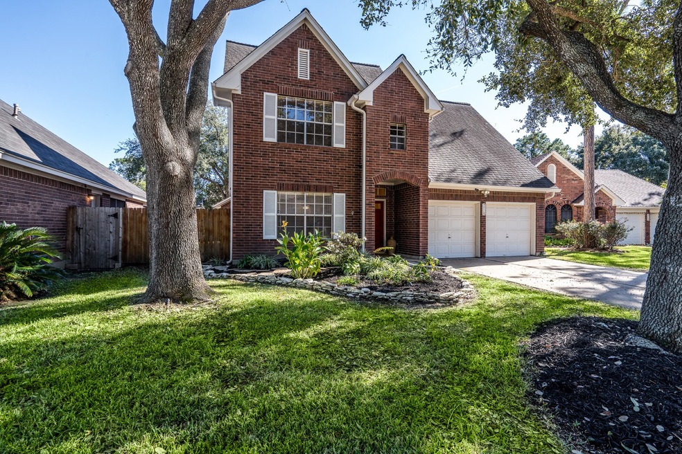 7710 Hidden Oaks Ln, Houston, TX 77095 - photo 1