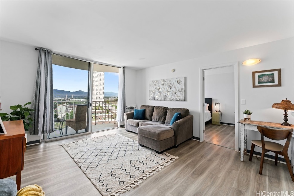 Living area of one bedroom, one bathroom unit with