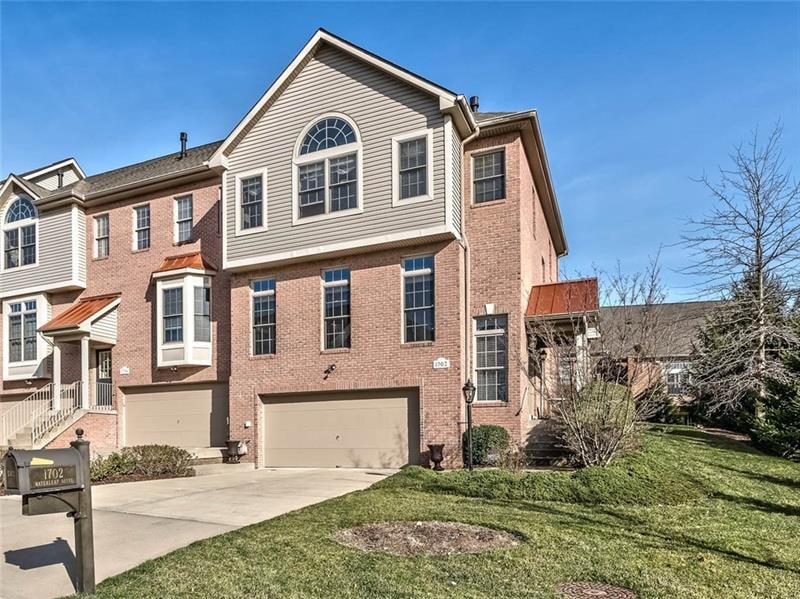 Immaculate Home Show Model End Unit Townhome featu