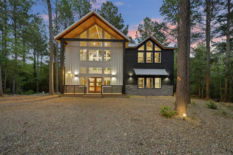 Back house at dusk with french doors