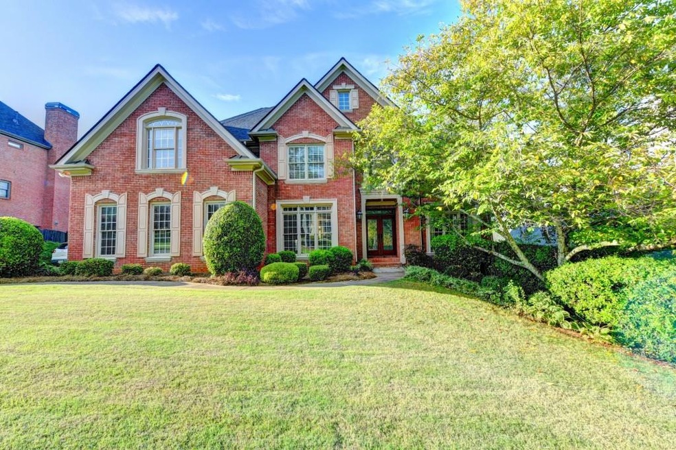 Gorgeous 4 sided brick executive style home in sou