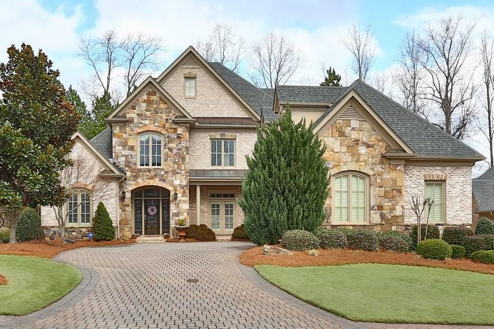 Welcome to this exquisite brick and stone home nea