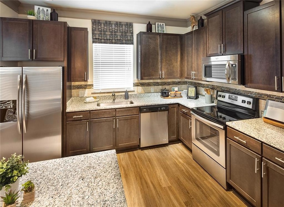 Kitchen featuring light hardwood / wood-style floo