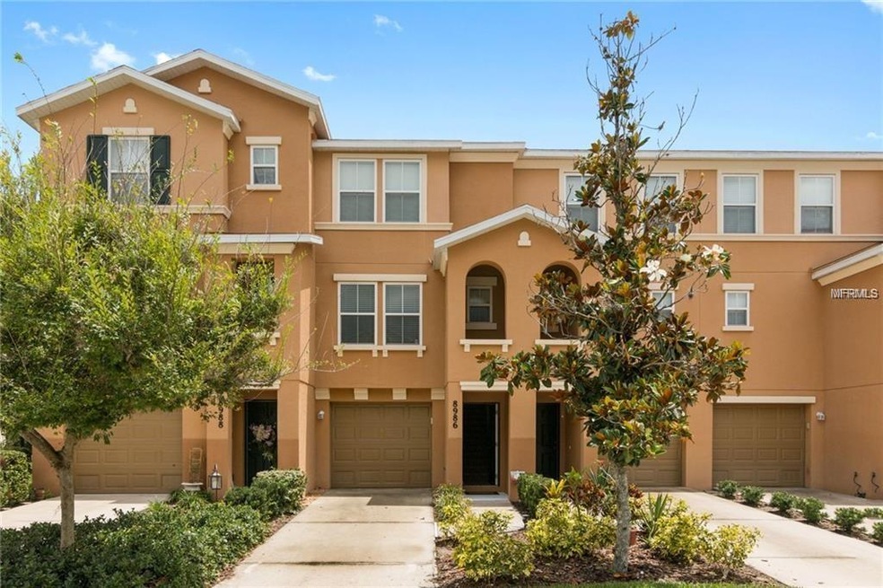 attractive curb appeal in this townhome in desirab