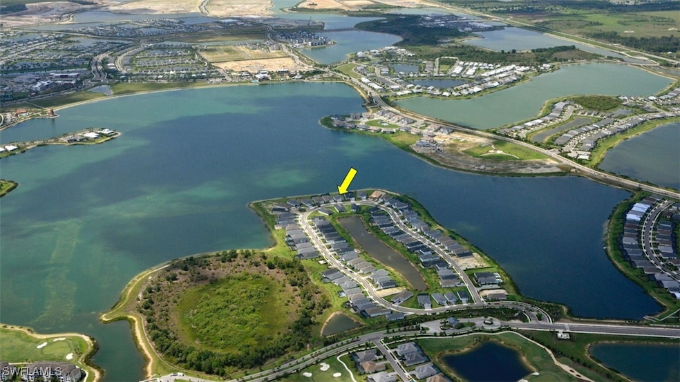 Aerial view of home and Lake Babcock