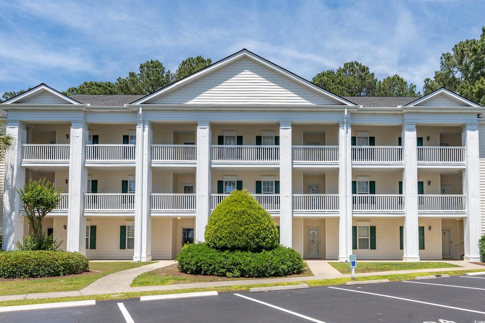 View of building exterior featuring uncovered park