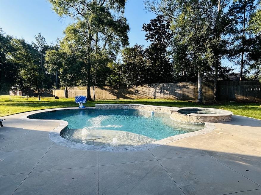Inviting crystal-clear pool with integrated spa, p