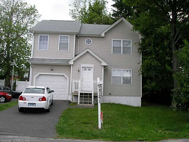 Exterior Front. Built 2006  < 1500 sq.ft. Colonial
