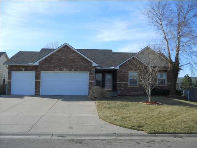 Front of home w oversize 3-car garage w insulated 