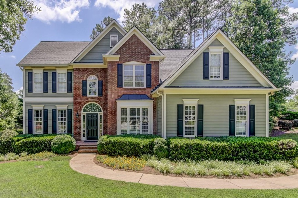 This gorgeous total renovation sits on more than h
