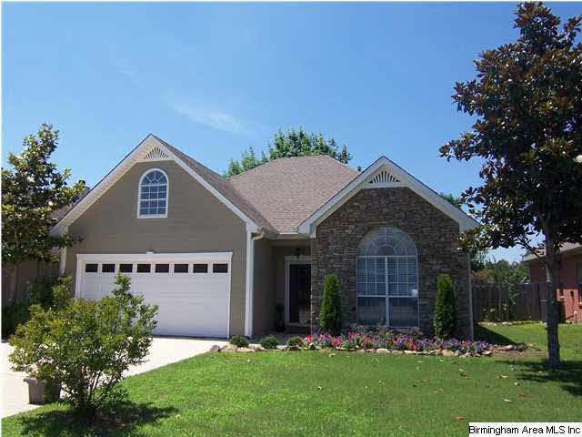4 bedroom 2 full bath home with gorgeous landscape