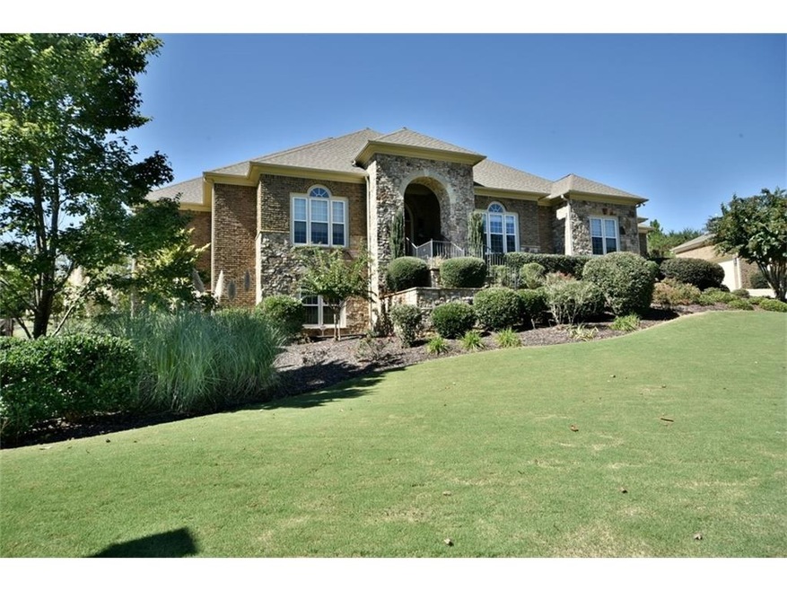 4 sides brick & stone ranch on .85 acre. First lev