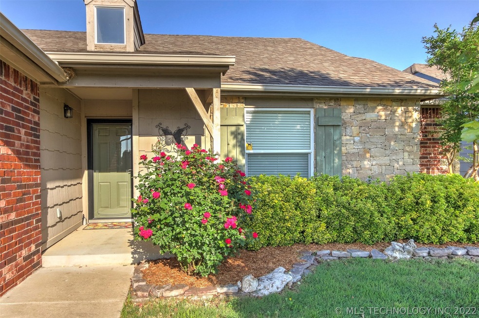 Curb Appeal Abounds in this home with Covered Fron