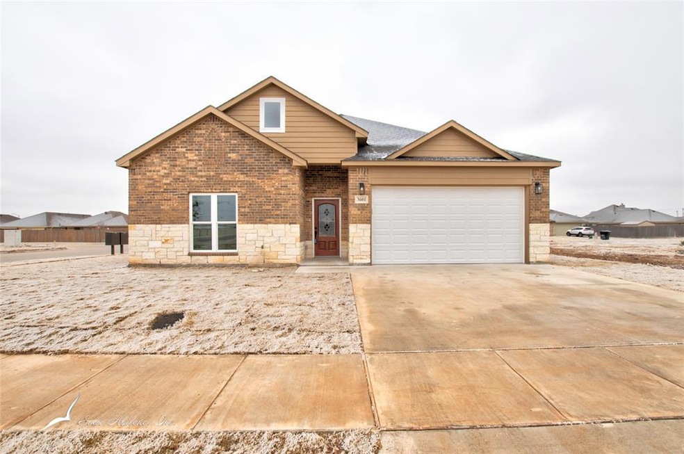 This four bedroom, two bath home sits on a corner 