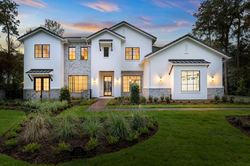 Stunning new construction home nestled in the hear