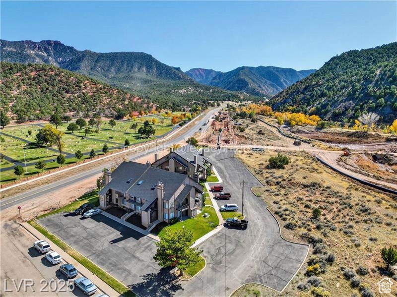 View of subject property featuring mountains