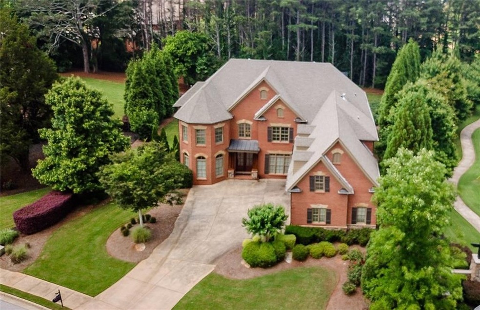 Gorgeous 4-sided brick home on a beautifully lands