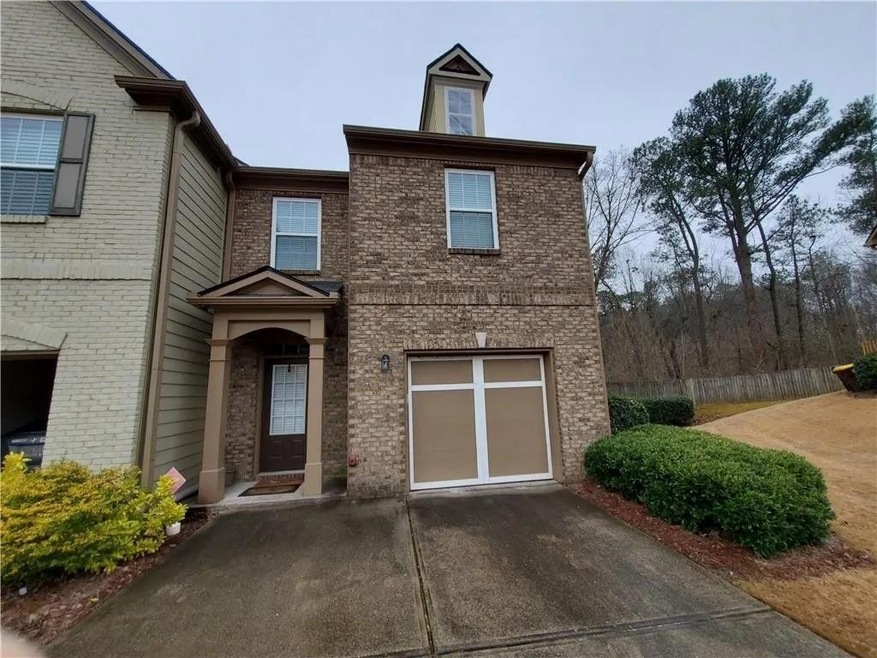 Front of property with a garage