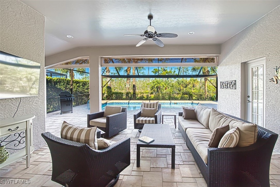 View of patio featuring an outdoor pool, a lanai,