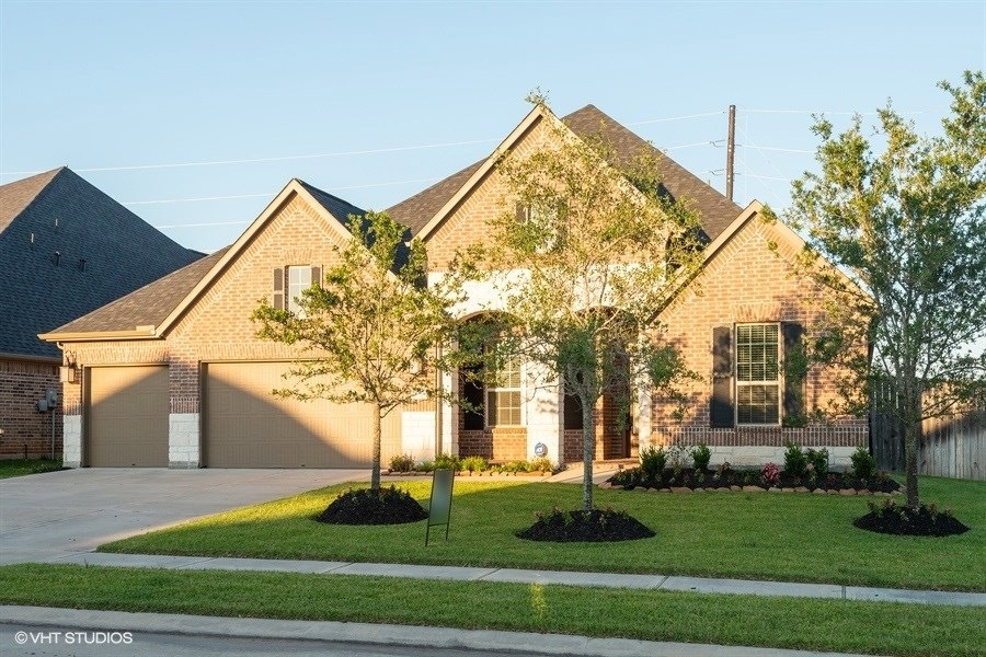 Beautiful stone and brick front elevation!