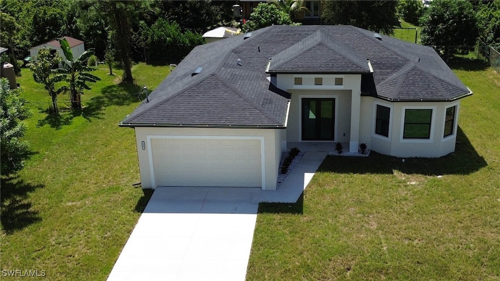 View of front of home featuring a garage and a fro