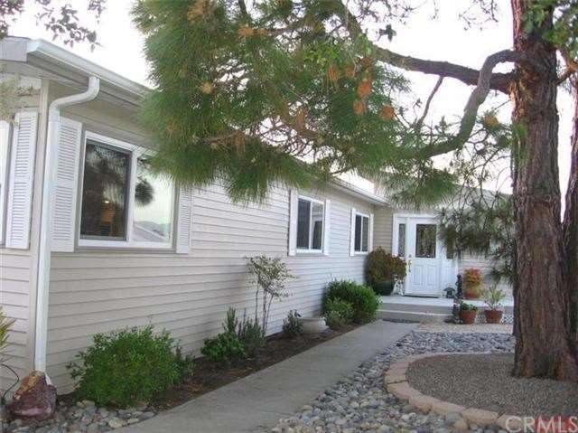 Private front entry with bevelled glass door and s