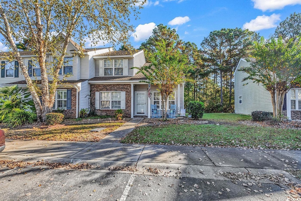 View of front of property with a front lawn