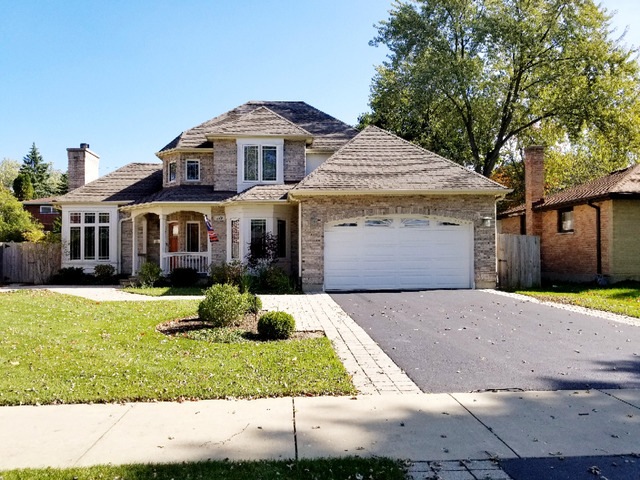 CUSTOM AND UNIQUE EXTERIOR WITH LONG DRIVEWAY AND 