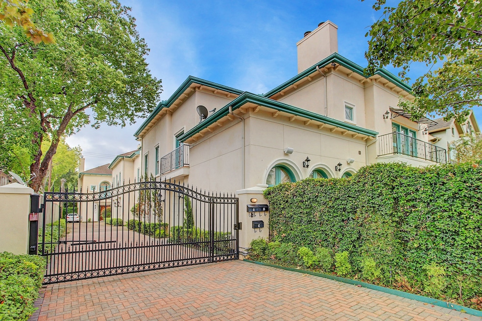 Experience this spacious and gracious, elevator capable, free standing villa with private gated driveway.