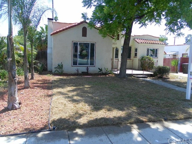 Front of Home with large picture large widows in l