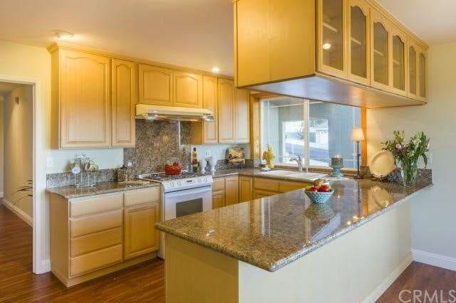 Remodeled kitchen with Maple cabinets, granite cou