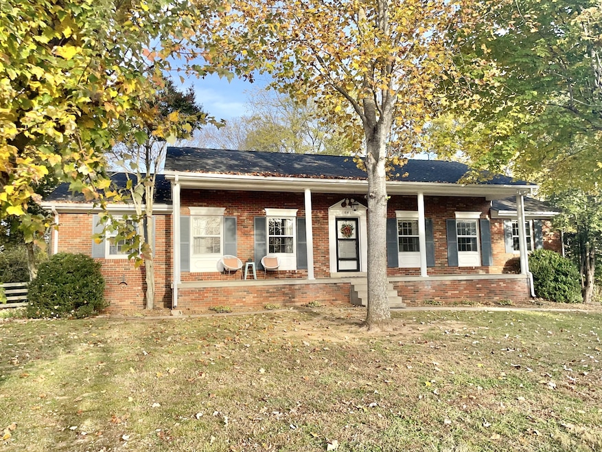 Nice all brick home with a large covered porch! 3 beds, 2 baths, full basement on 2.3 acres. Located only 5.5 miles to I-65!
